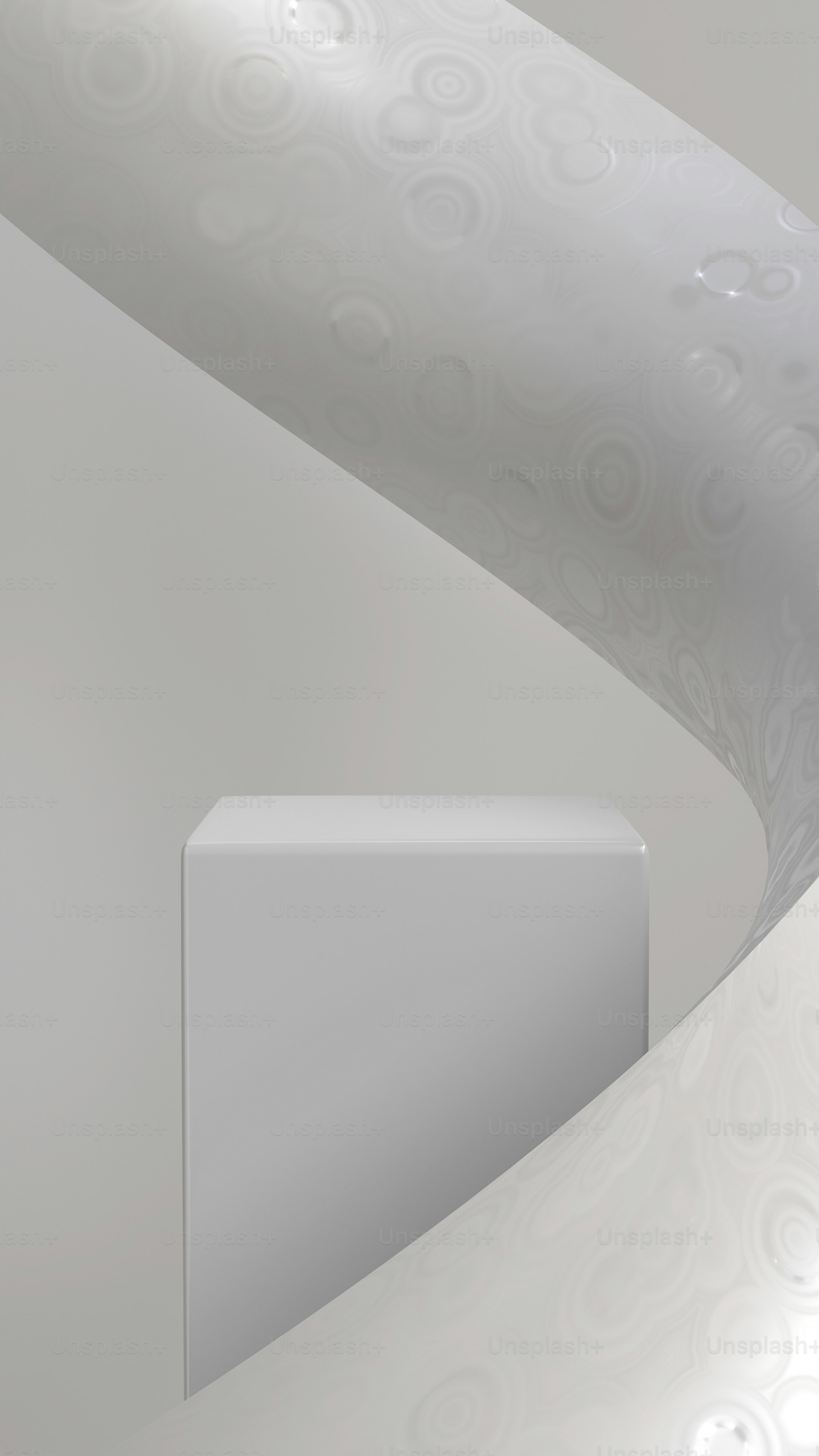 a white object is in the corner of a room