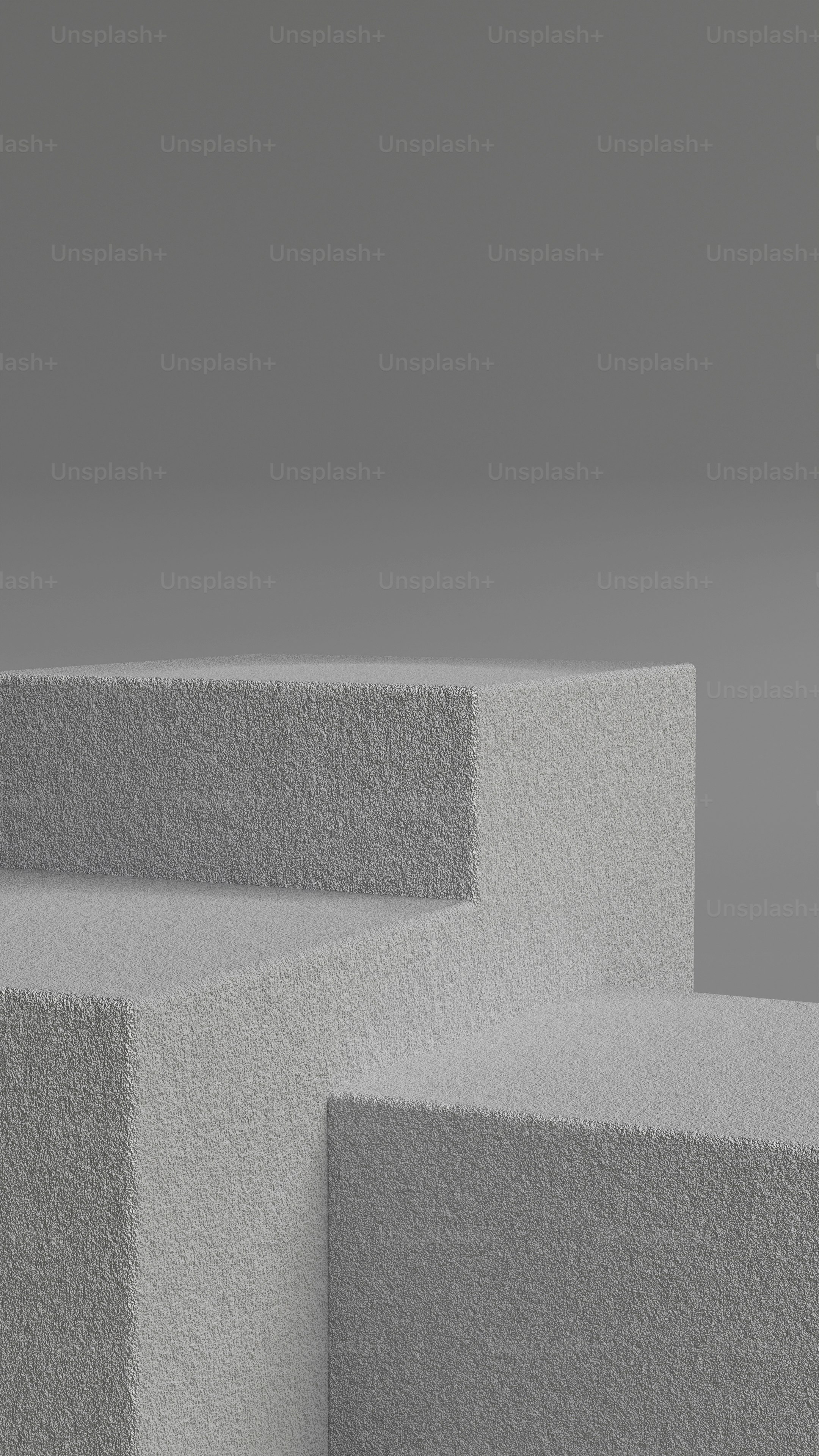 a black and white photo of three blocks of cement