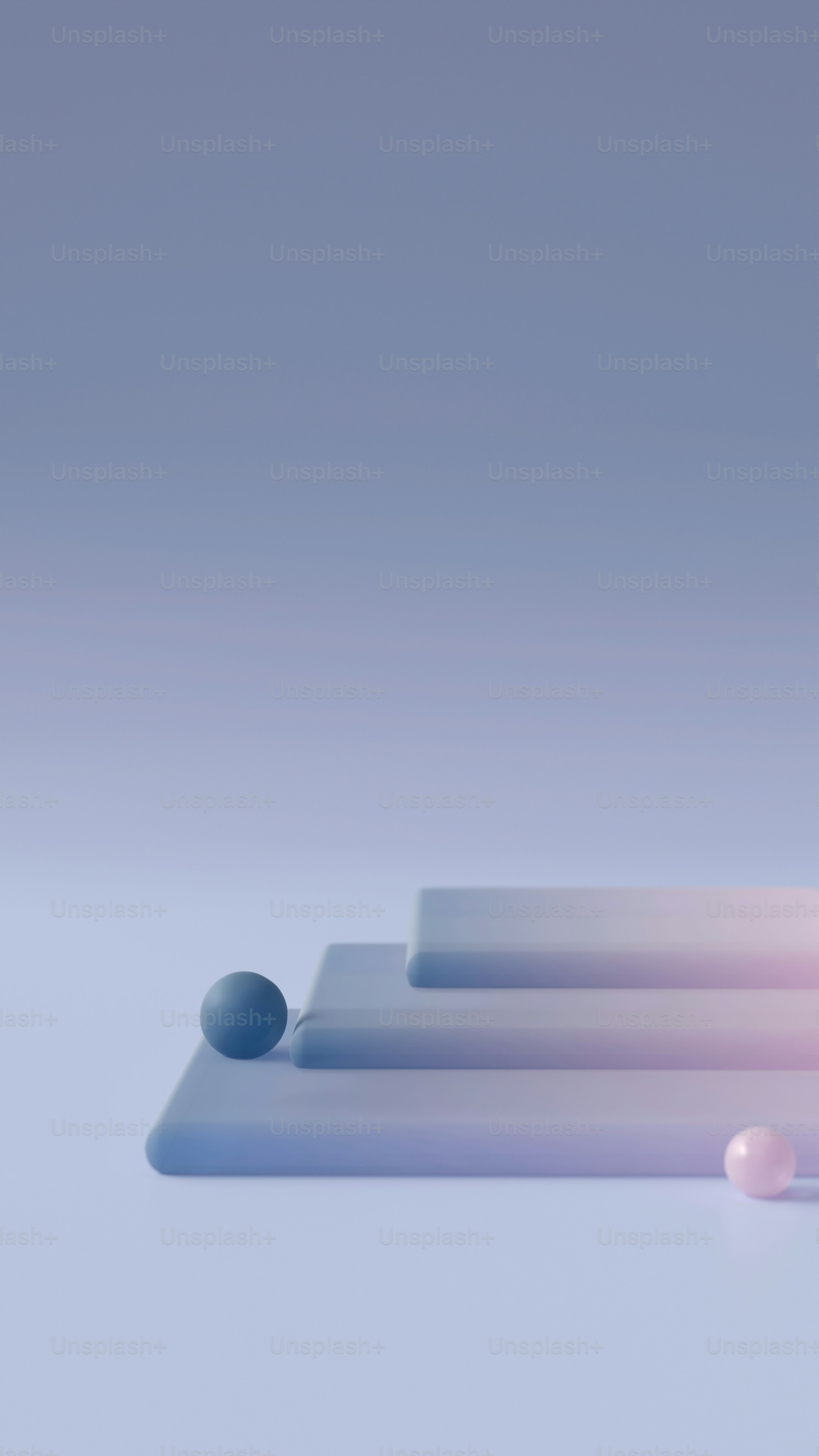 a glass of water and some balls on a table