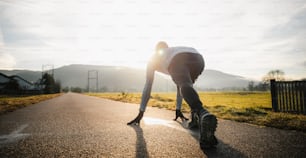 a man riding a skateboard down a street