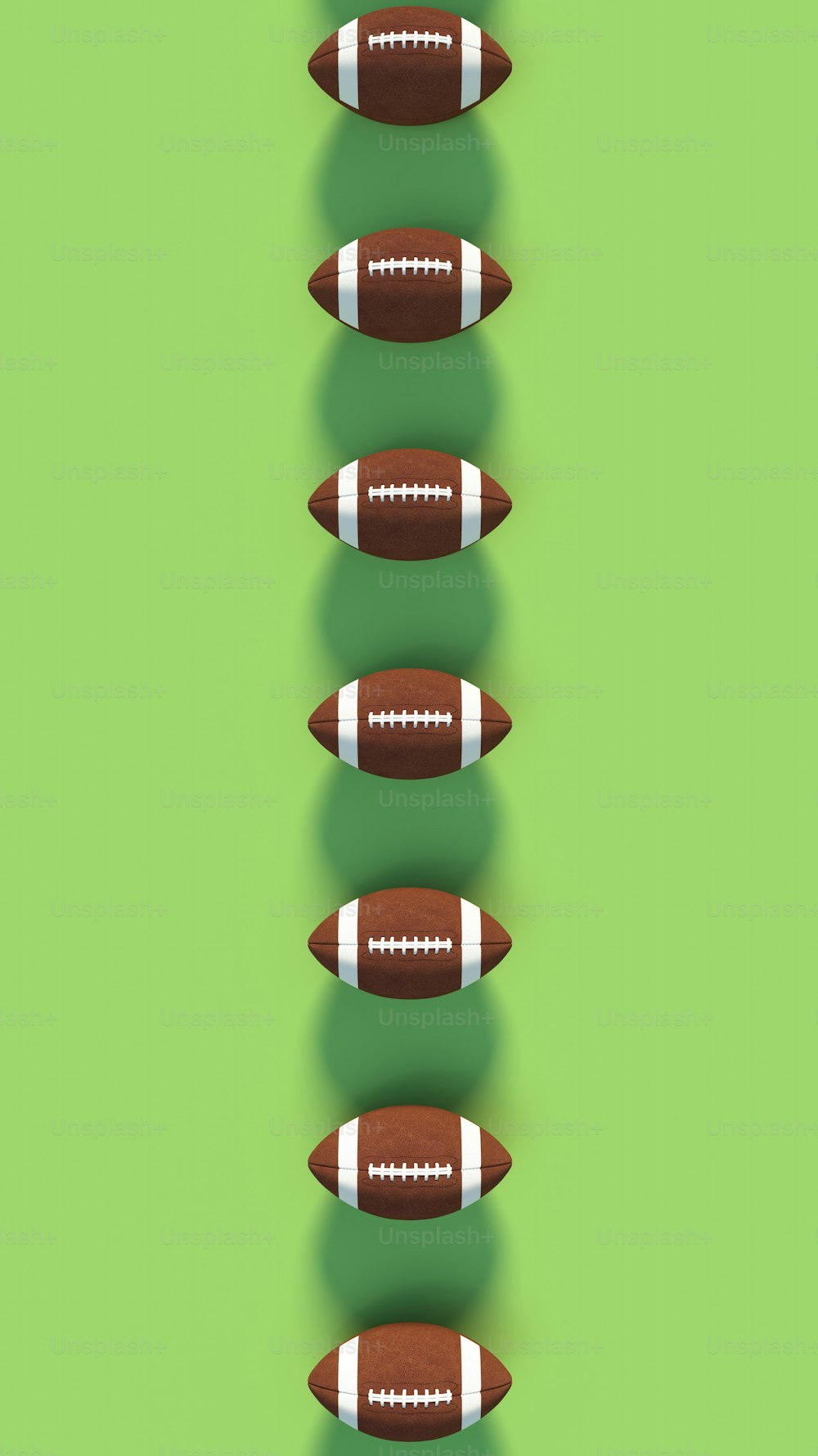 a group of footballs sitting on top of each other