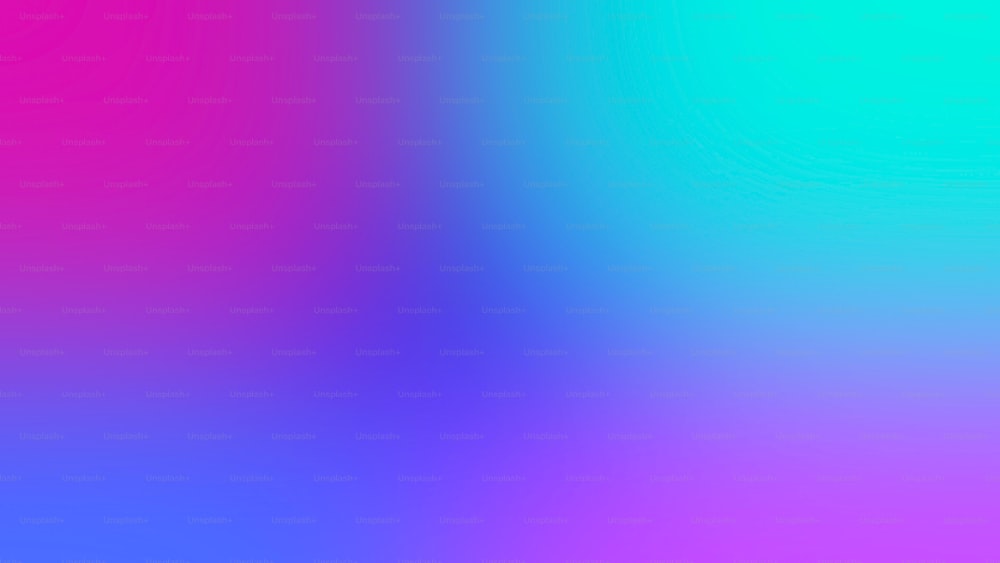 a blurry image of a blue and pink background