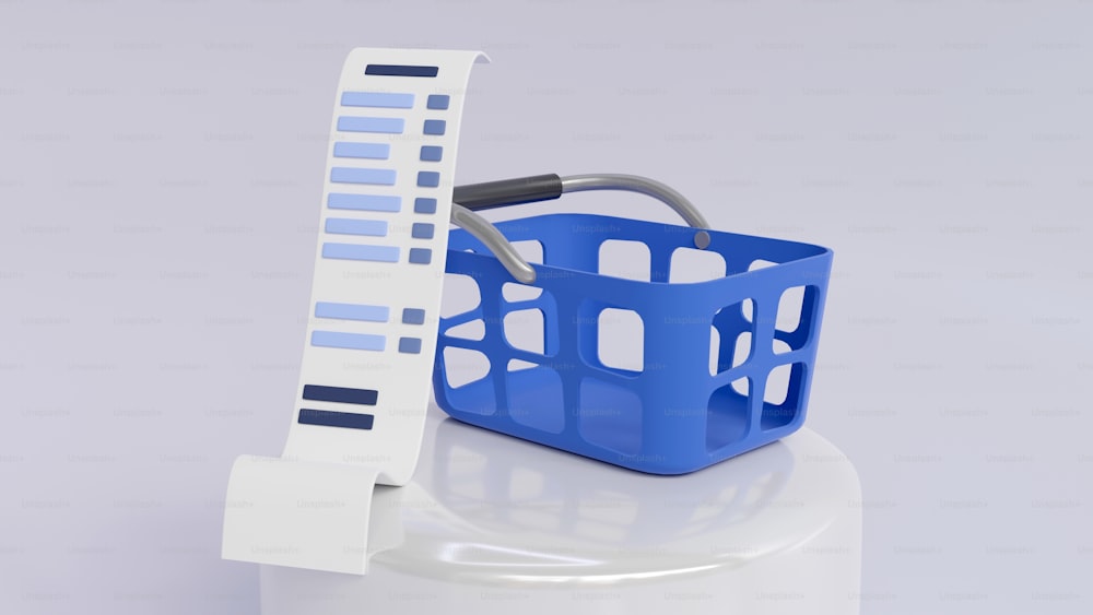 a blue basket with a handle next to a ruler