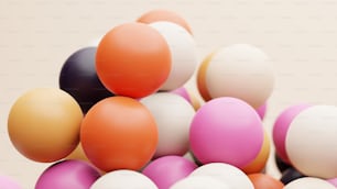 a pile of colorful balls sitting on top of each other
