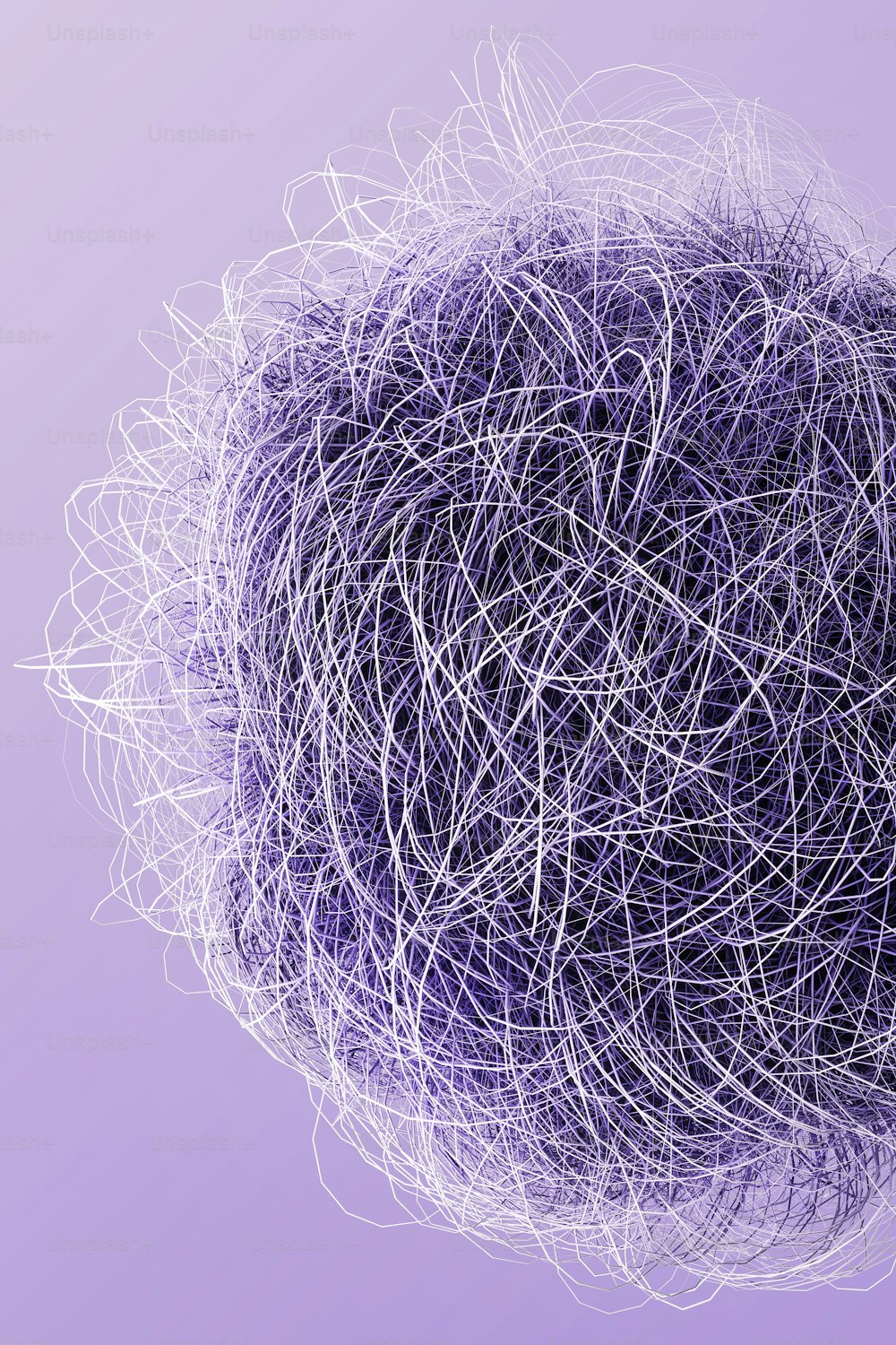 紫色の背景に糸のボール