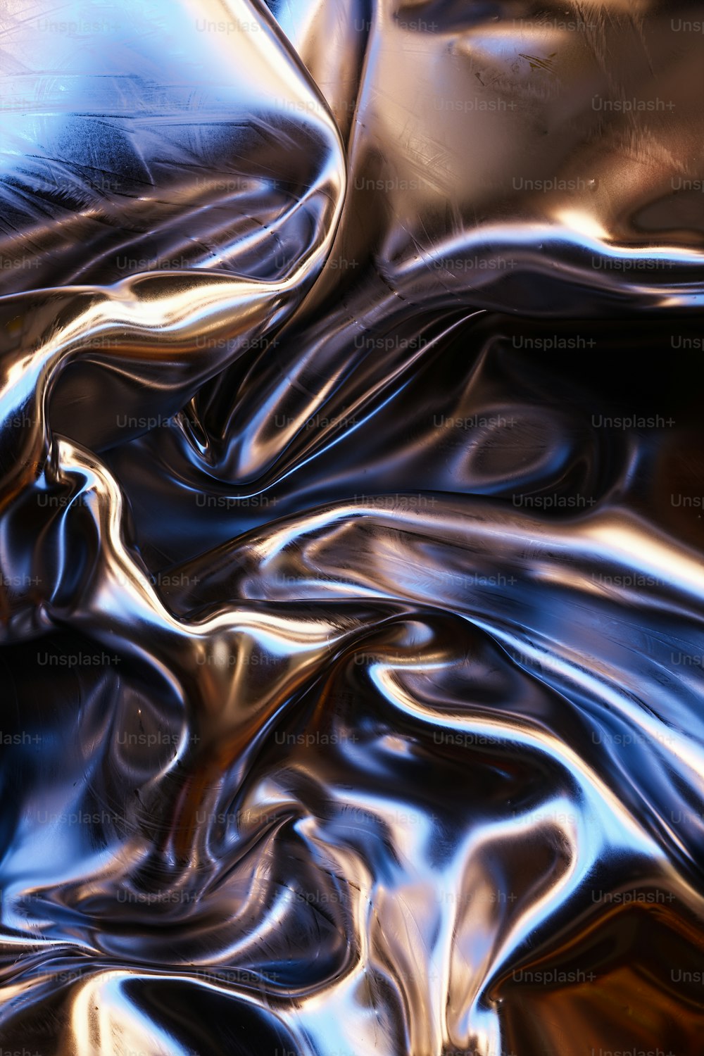 um close up de uma superfície de metal brilhante
