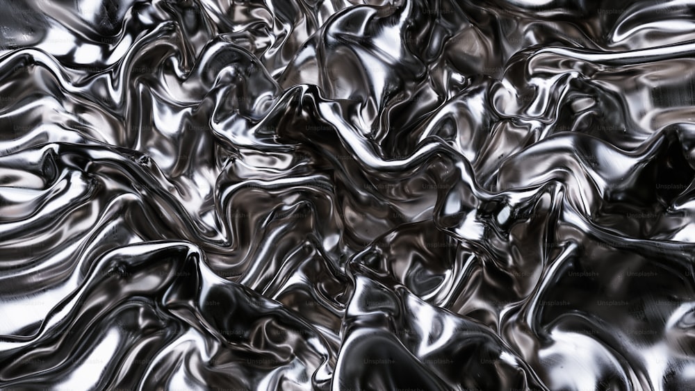 a close up of a metal surface with wavy lines