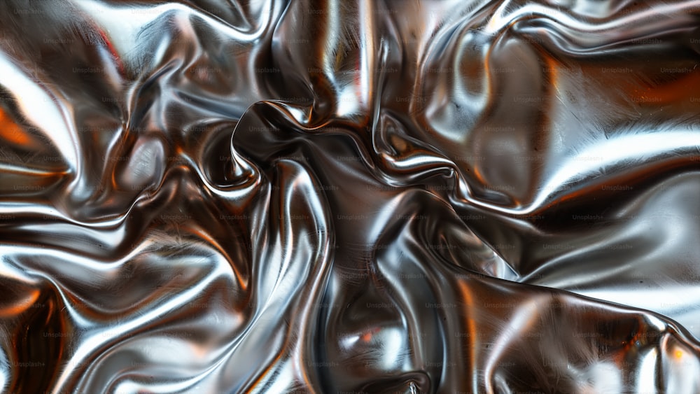 una superficie metallica con una grande quantità di materiale lucido