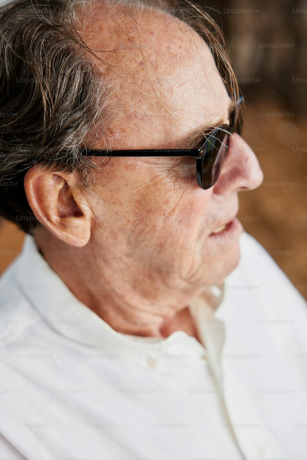 a close up of a person wearing sunglasses