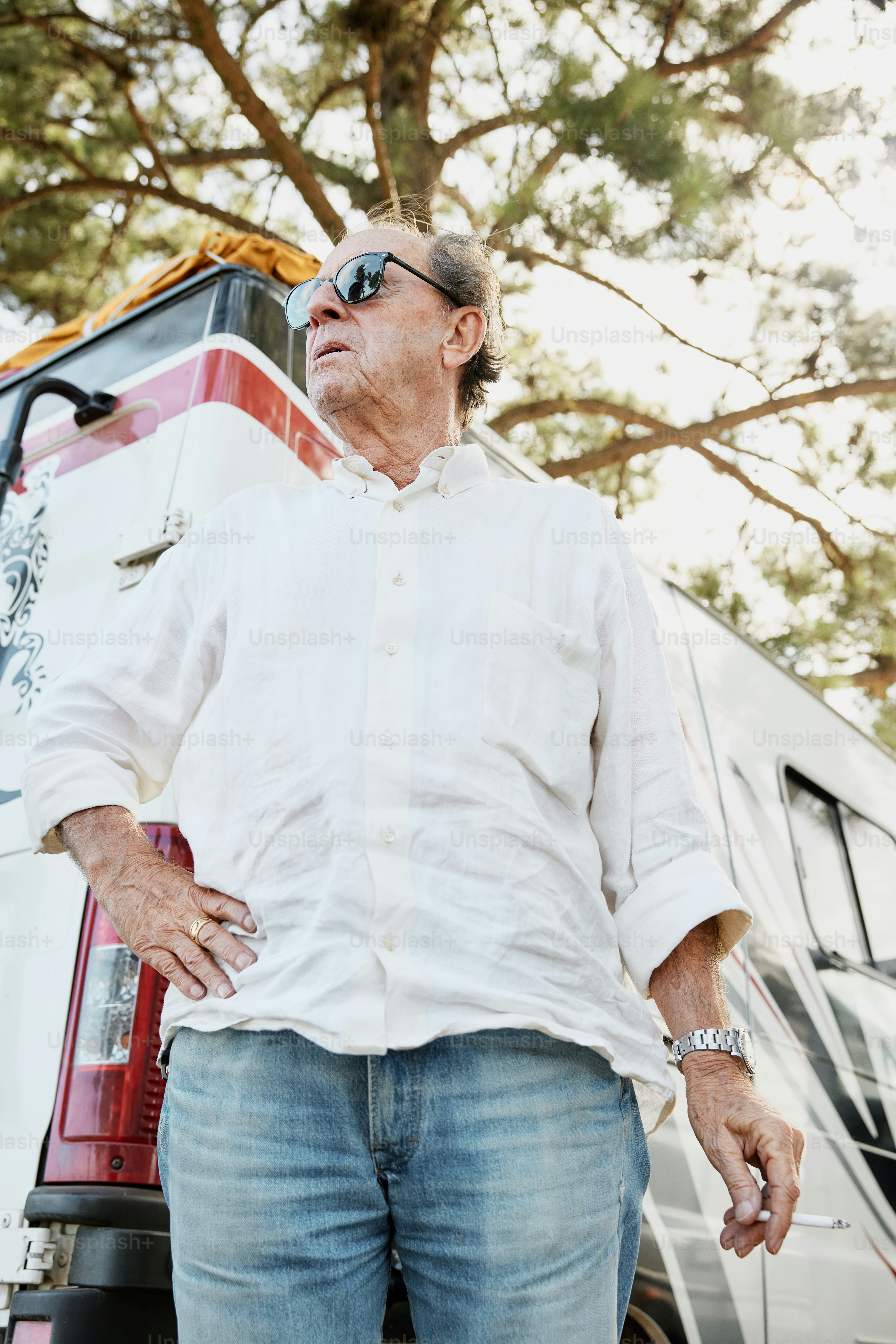 a man standing in front of a truck