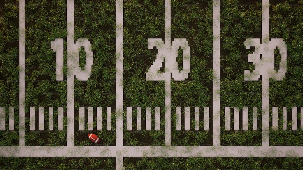 an aerial view of a football field with grass