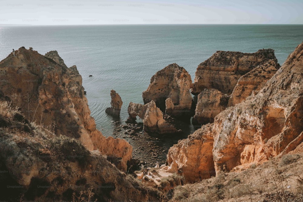 a view of a body of water from a cliff