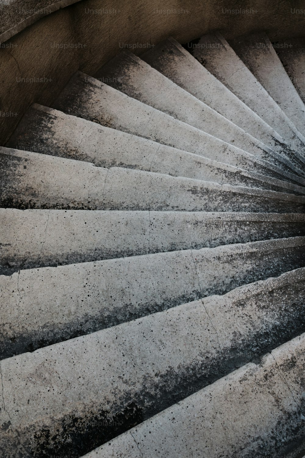 a close up of a spiral staircase in a building