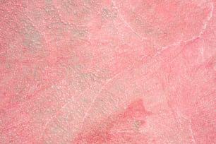 a close up of a pink and grey surface