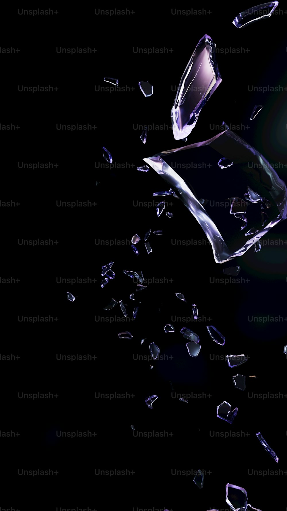 an ice cube falling into the air on a black background