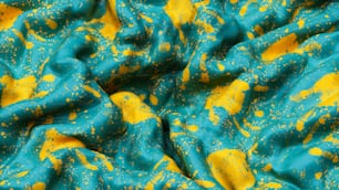 a blue and yellow fabric with yellow spots