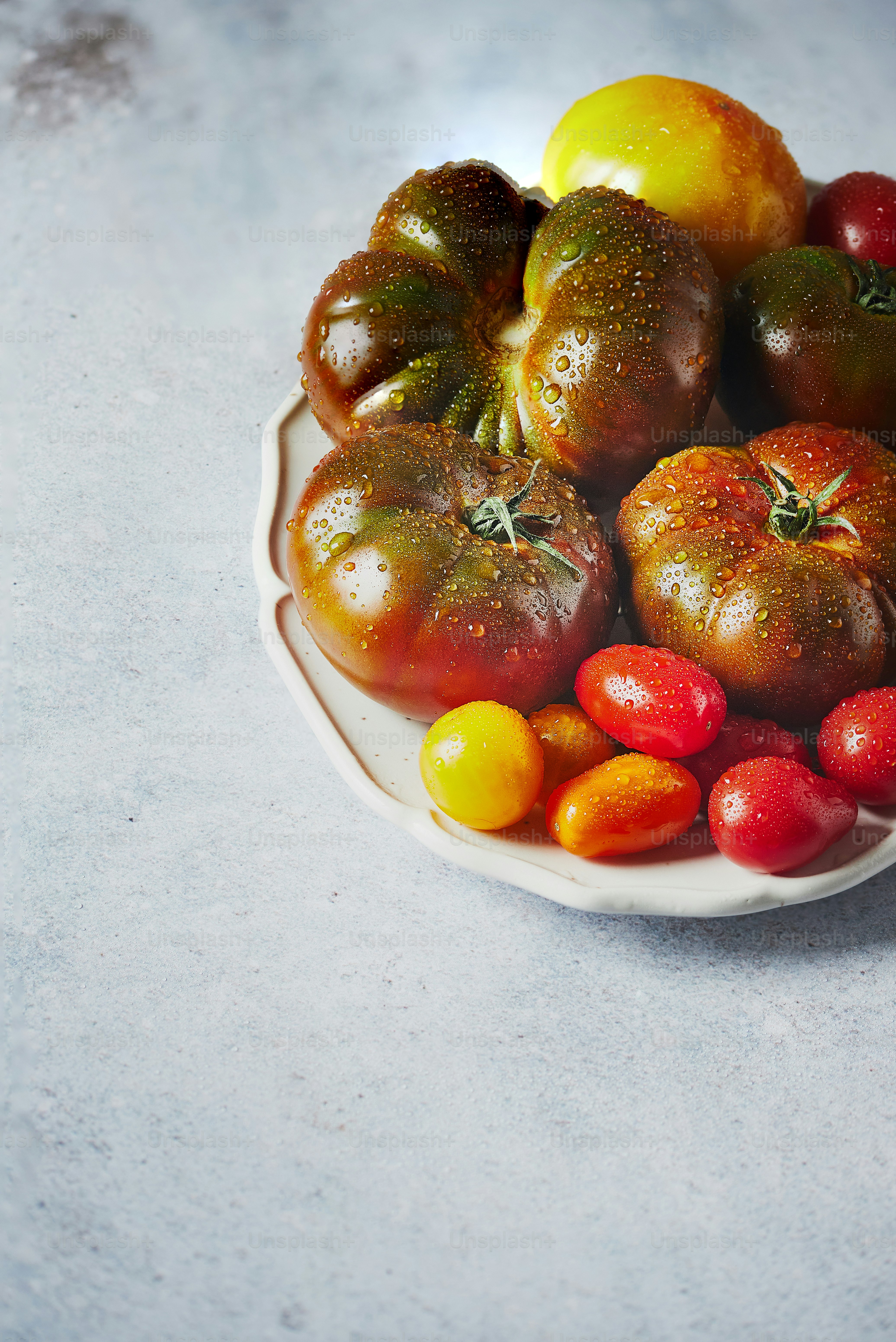 a white bowl filled with lots of different types of fruit