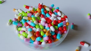 a bowl filled with lots of colorful candies
