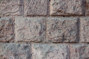 Un primer plano de una pared hecha de ladrillos