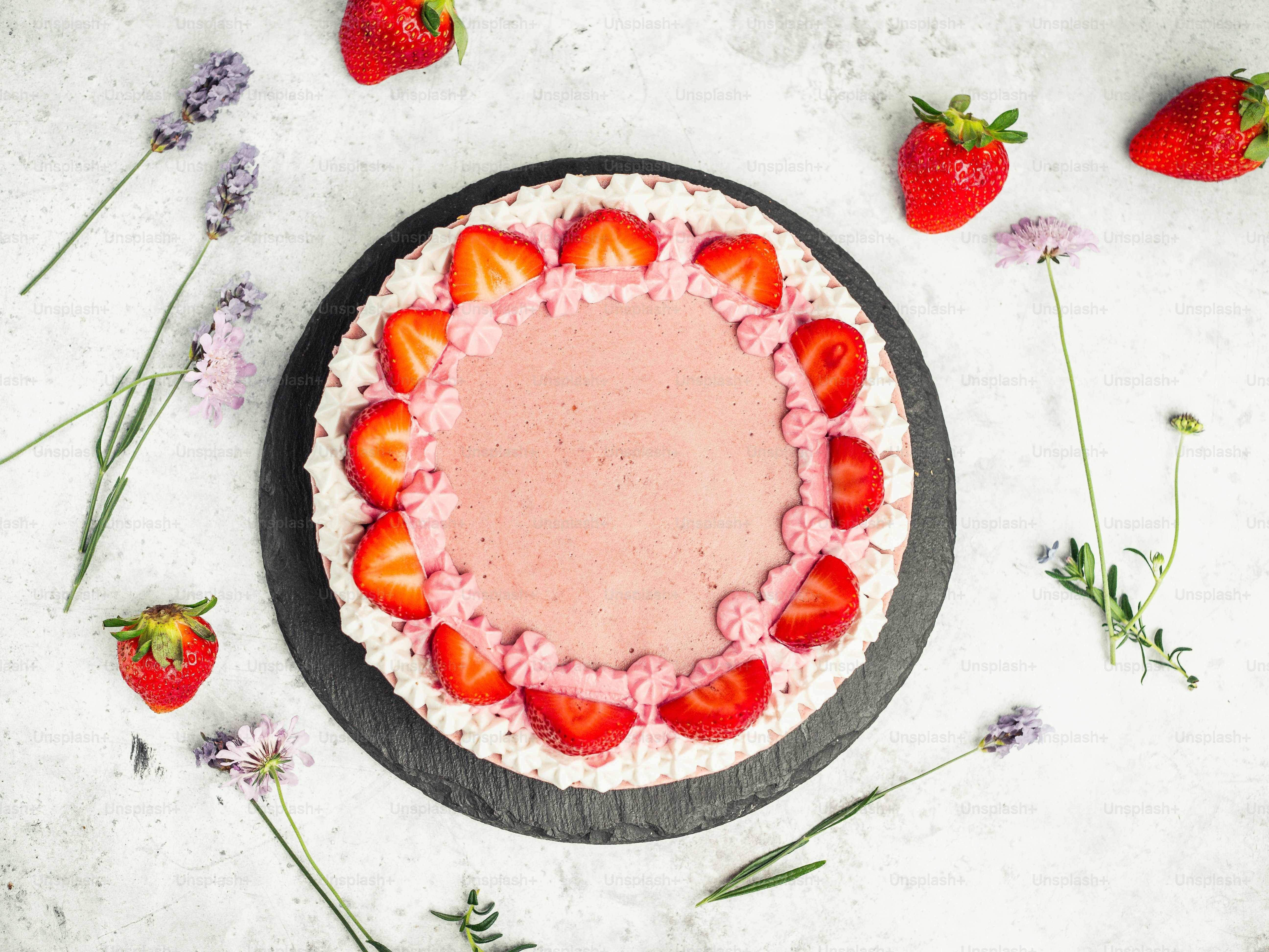 a cake with strawberries on top of it