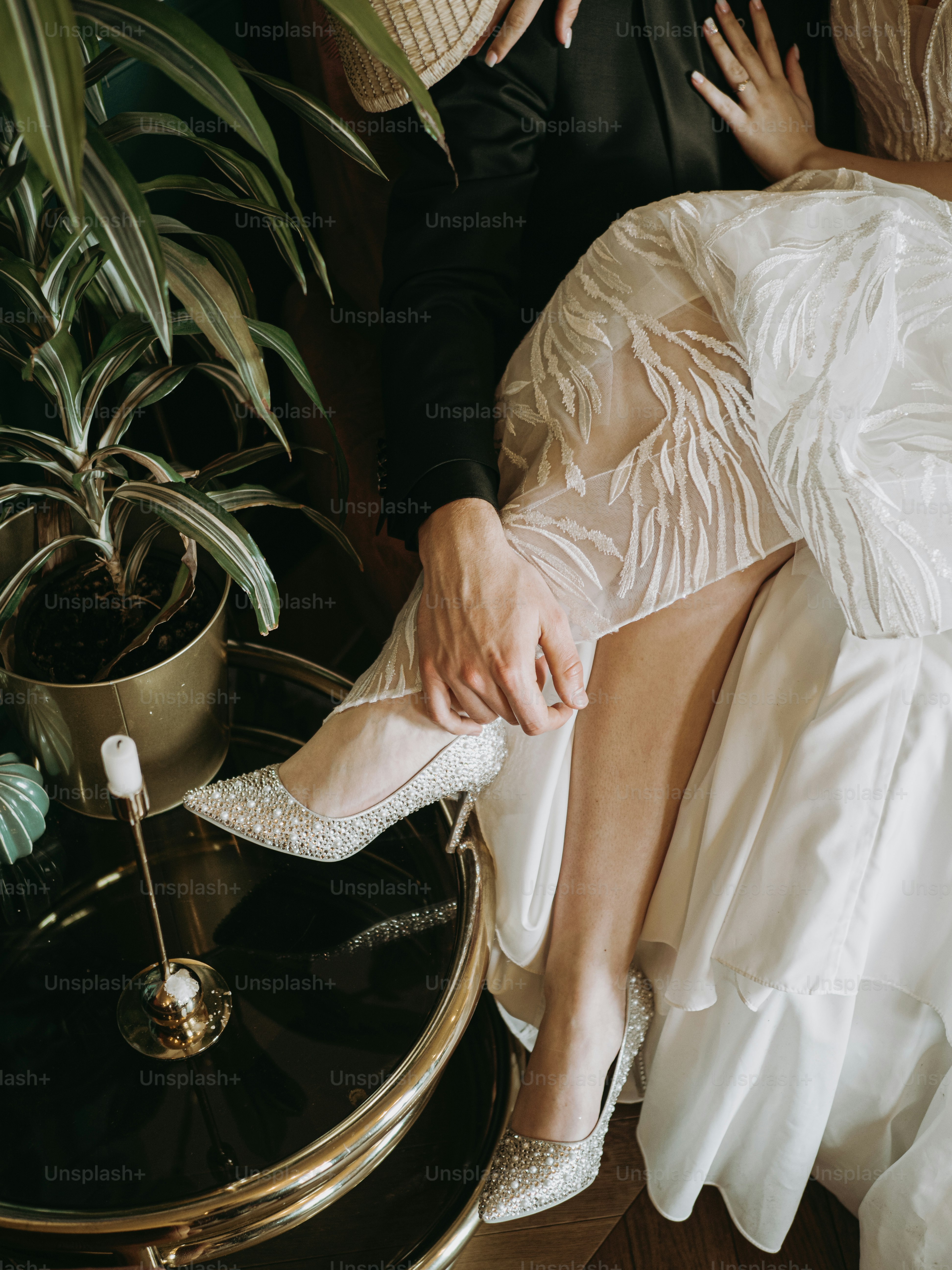 a woman in a white dress and a man in a suit