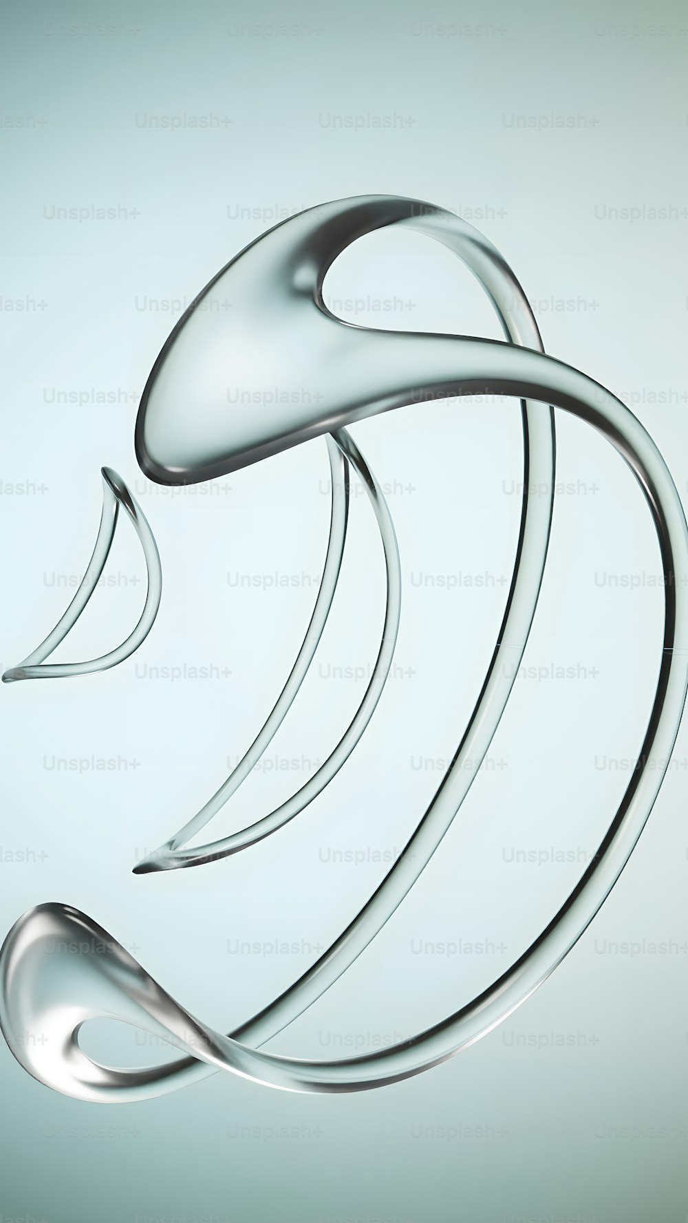 a silver object with a curved design on it