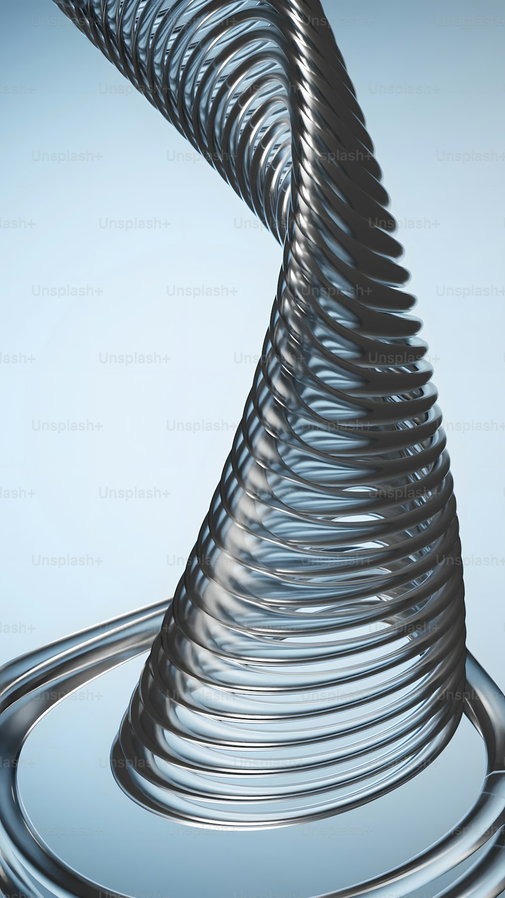 a spiral of metal on a blue background
