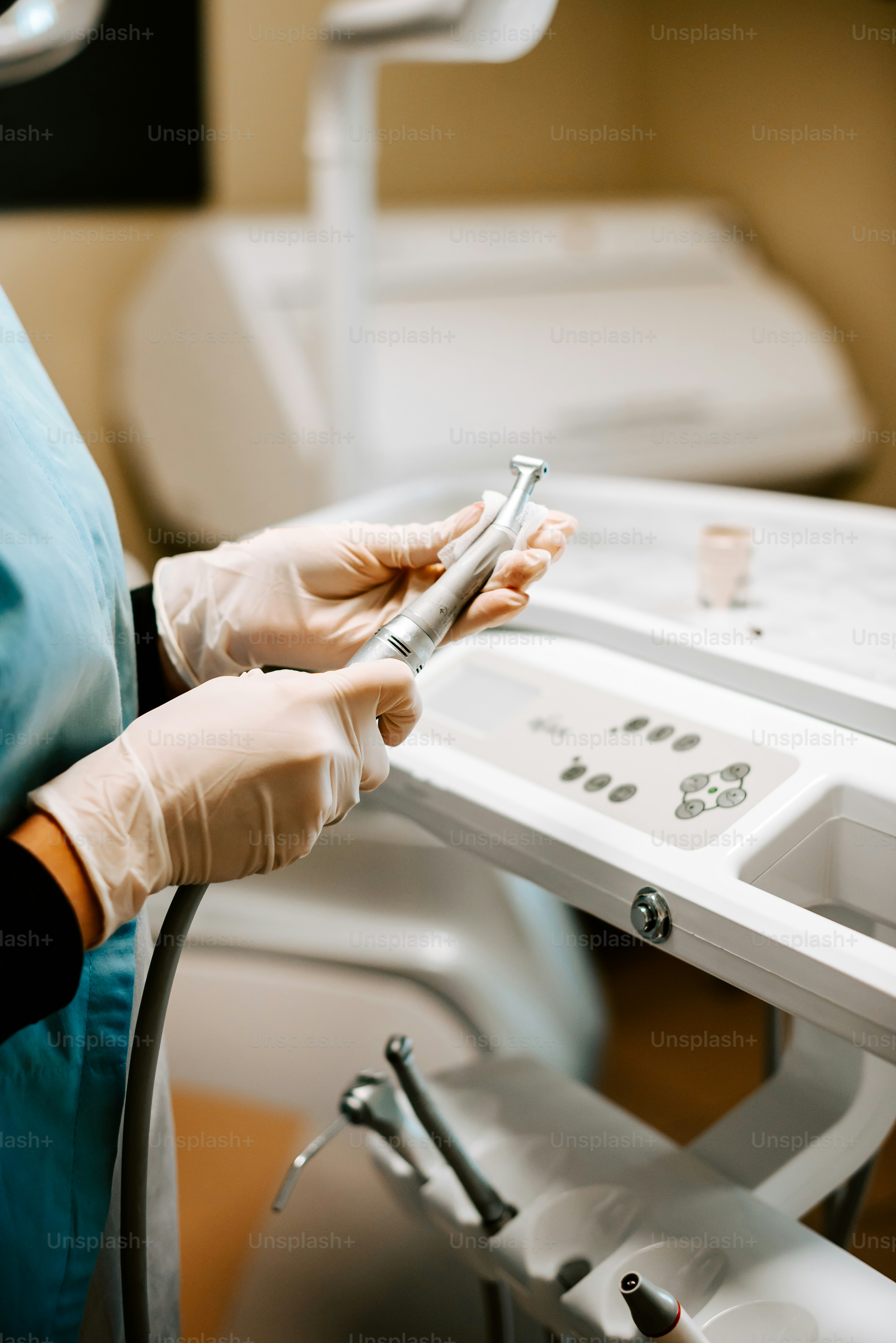 a person in a hospital gown holding a cell phone