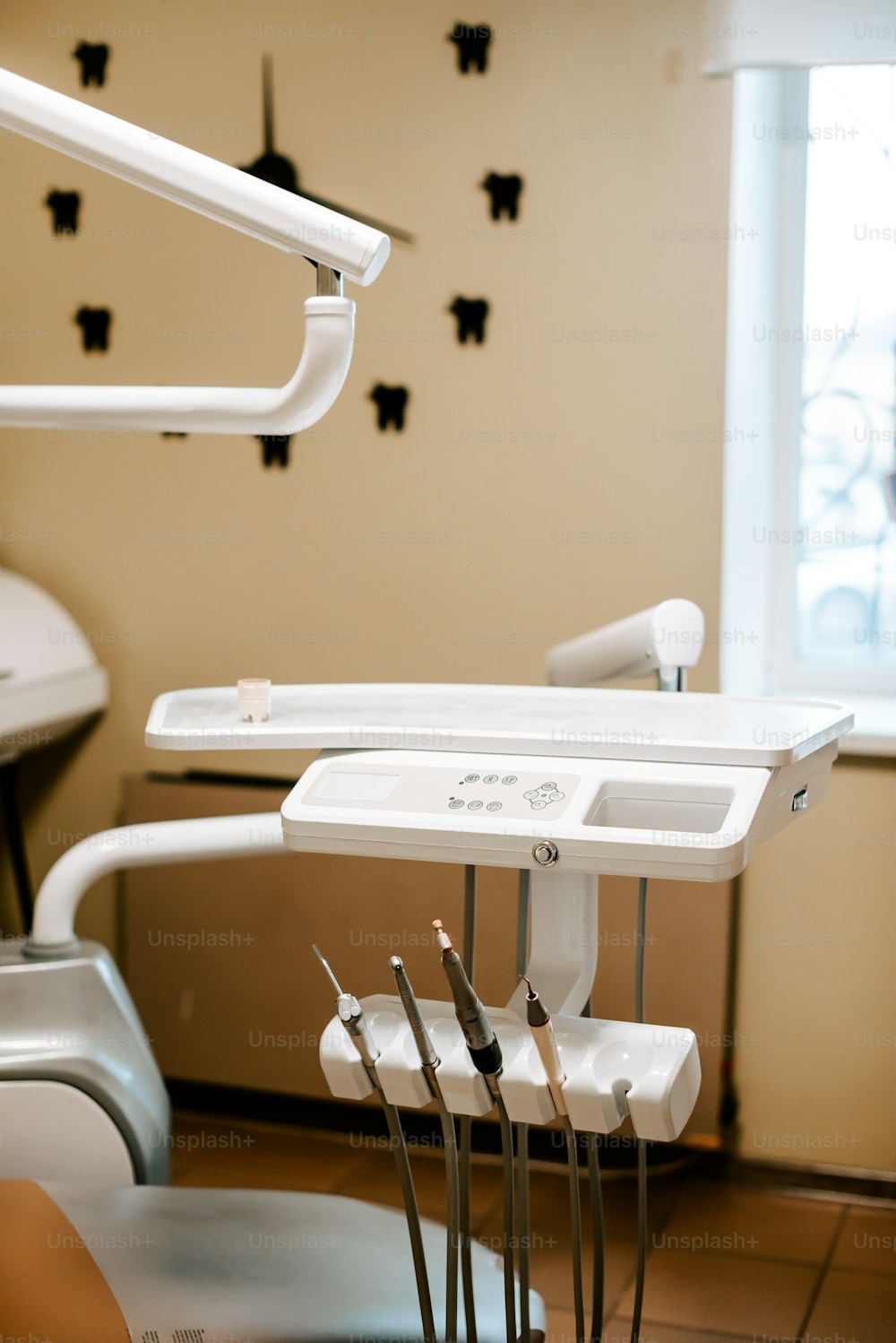 a dentist chair with dental tools in it