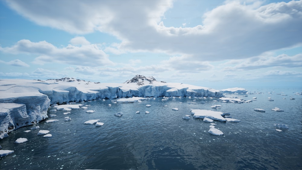 a group of icebergs floating on top of a body of water