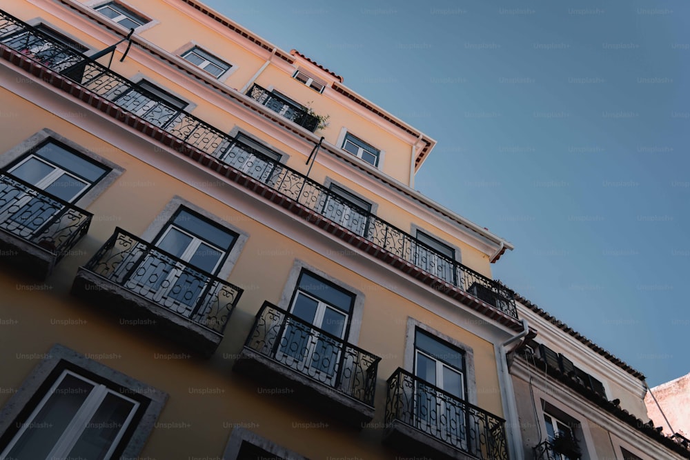 a tall building with balconies and balconies on it