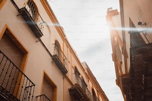 the sun shines brightly through the windows of a building