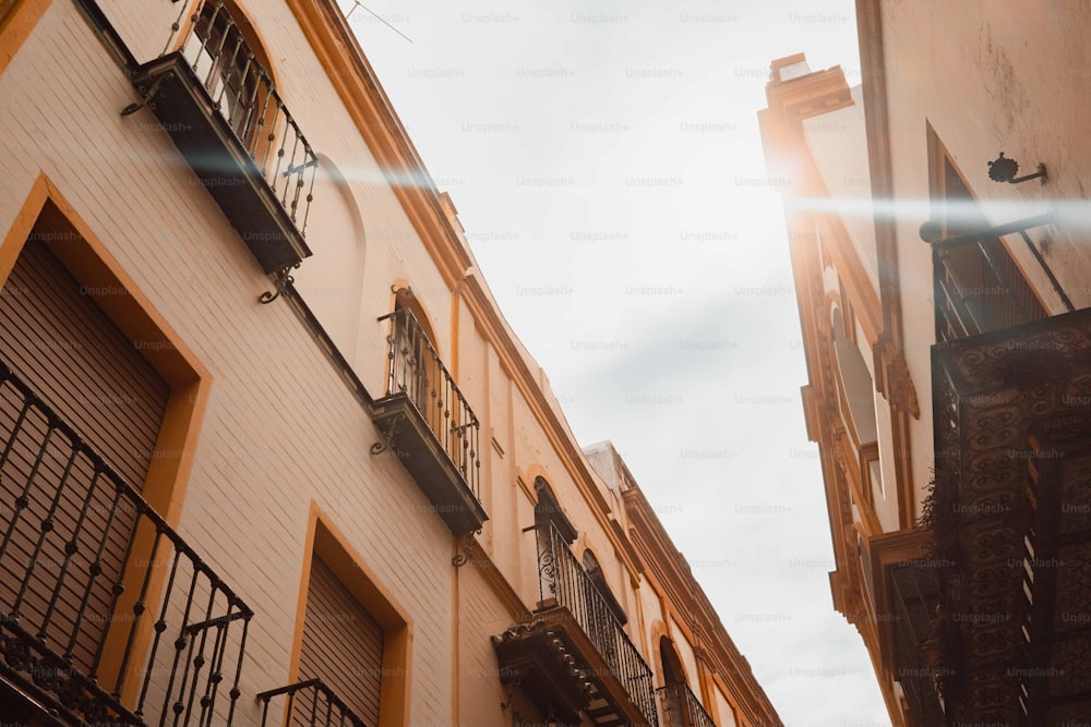 the sun shines brightly through the windows of a building