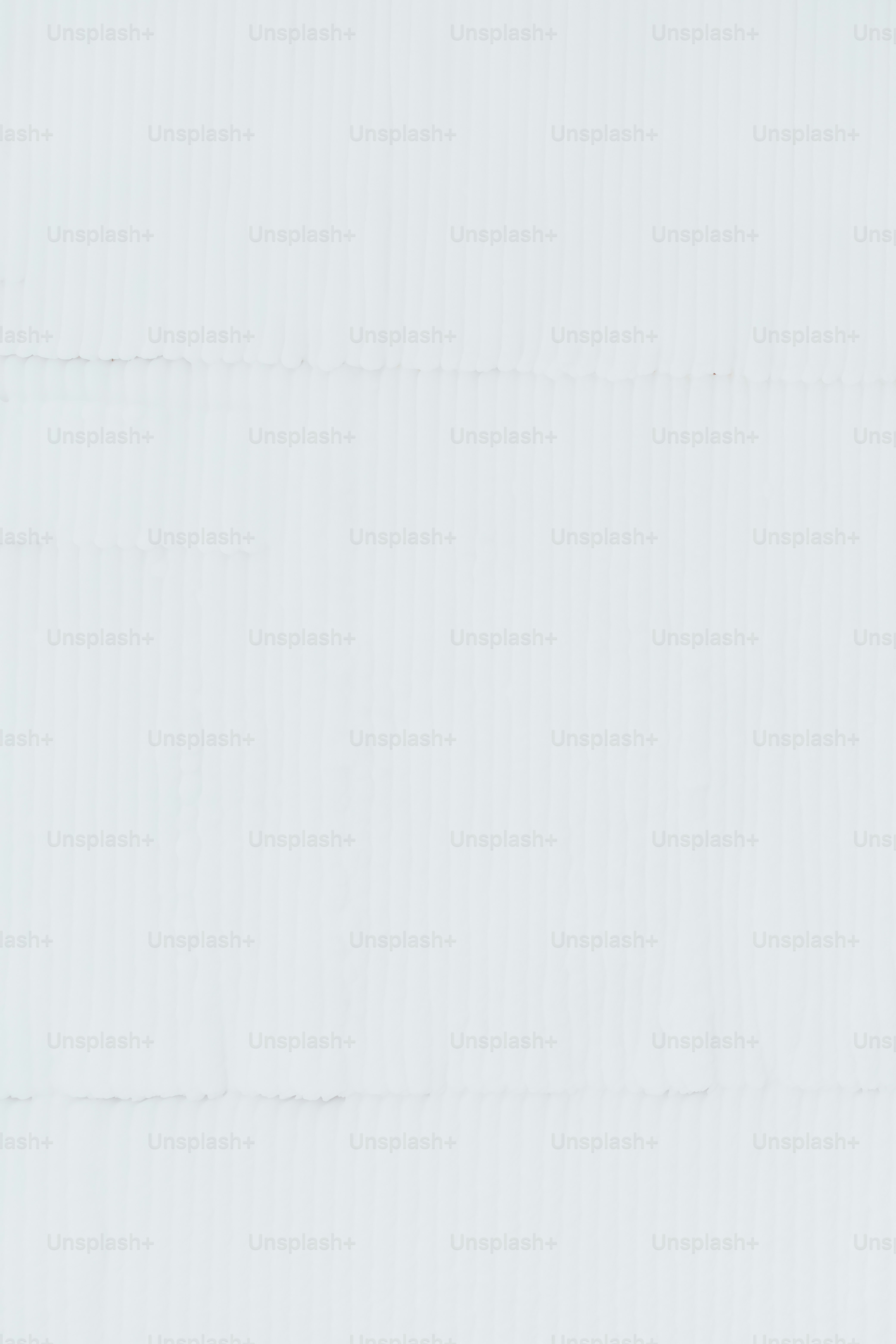 a man is skiing down a snowy hill