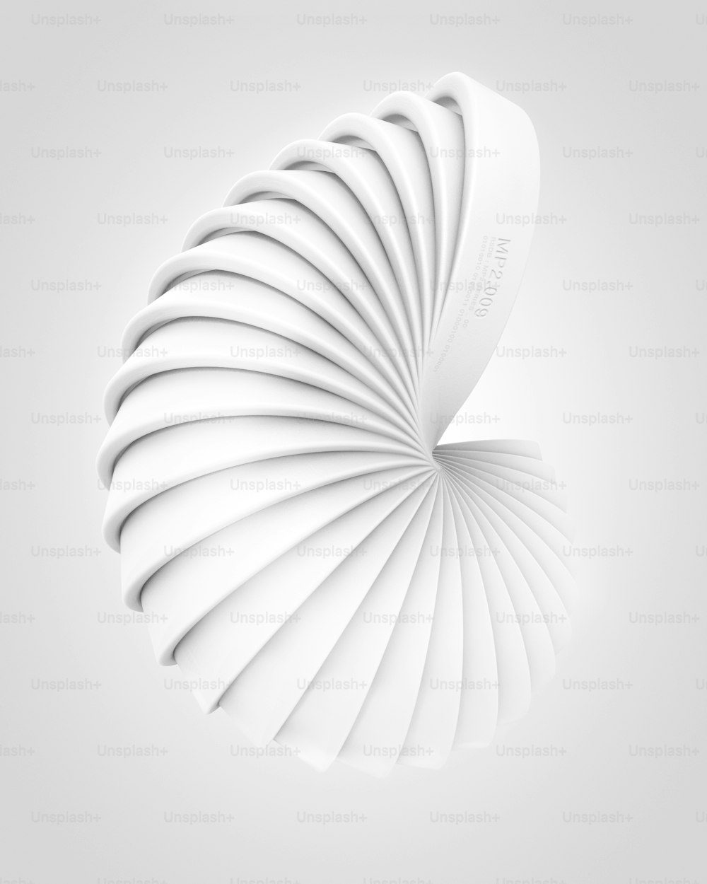 a white object with a spiral design on it