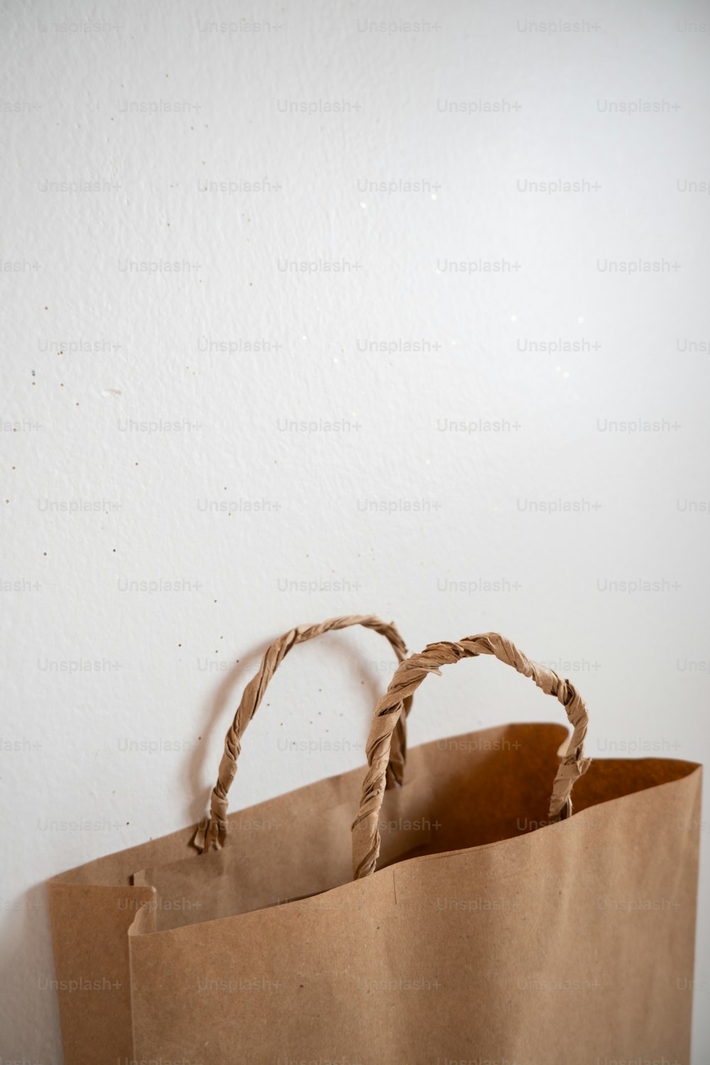 a brown paper bag sitting on top of a table