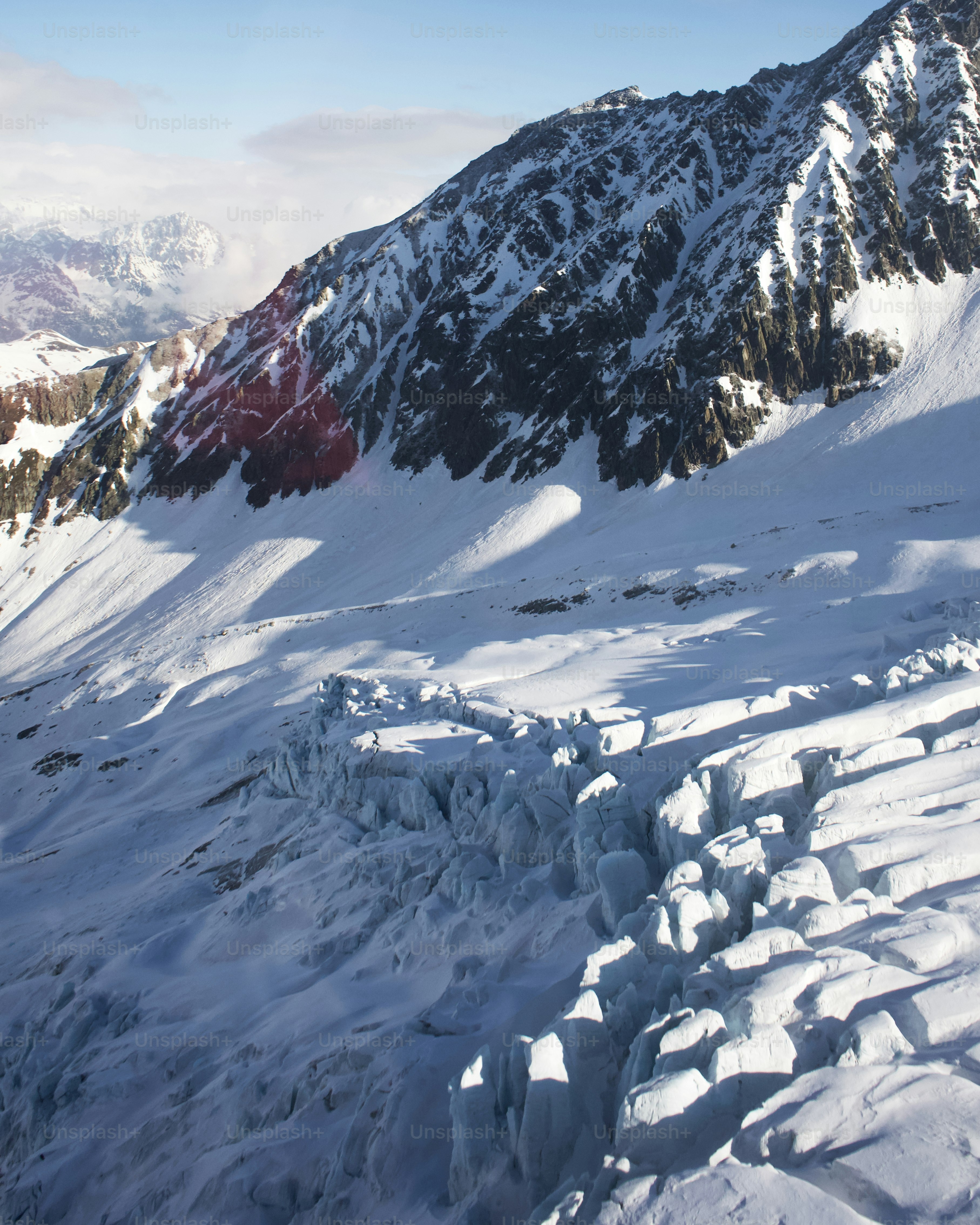 a mountain covered in snow with lots of snow on it