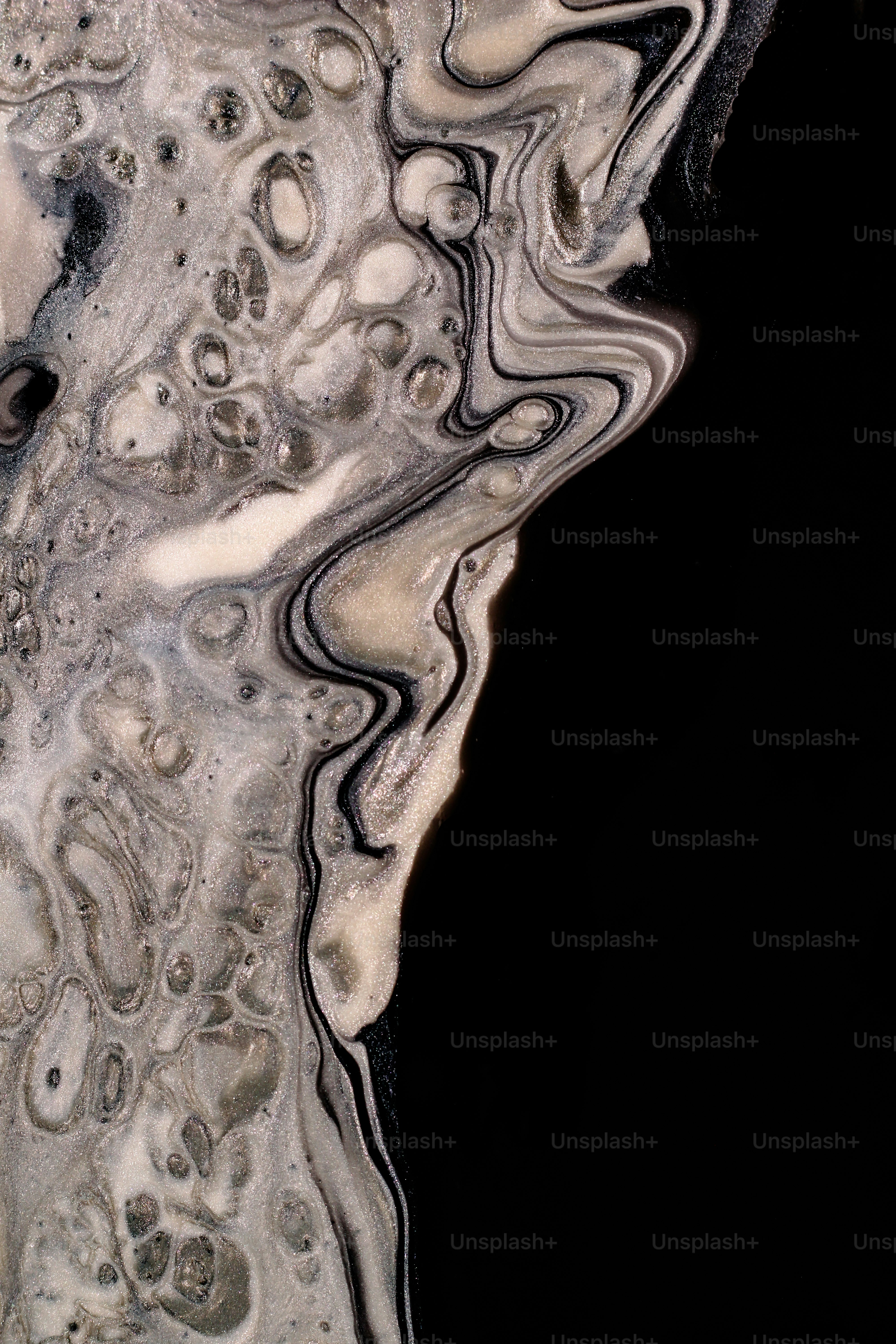 a close up of a black and white substance