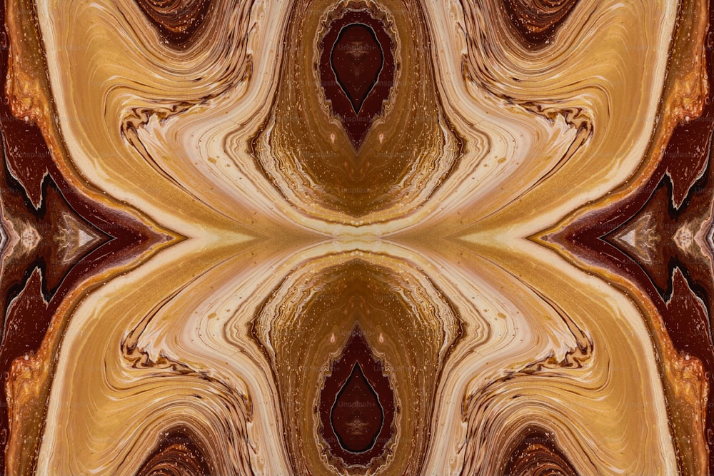 an abstract image of a gold and brown pattern