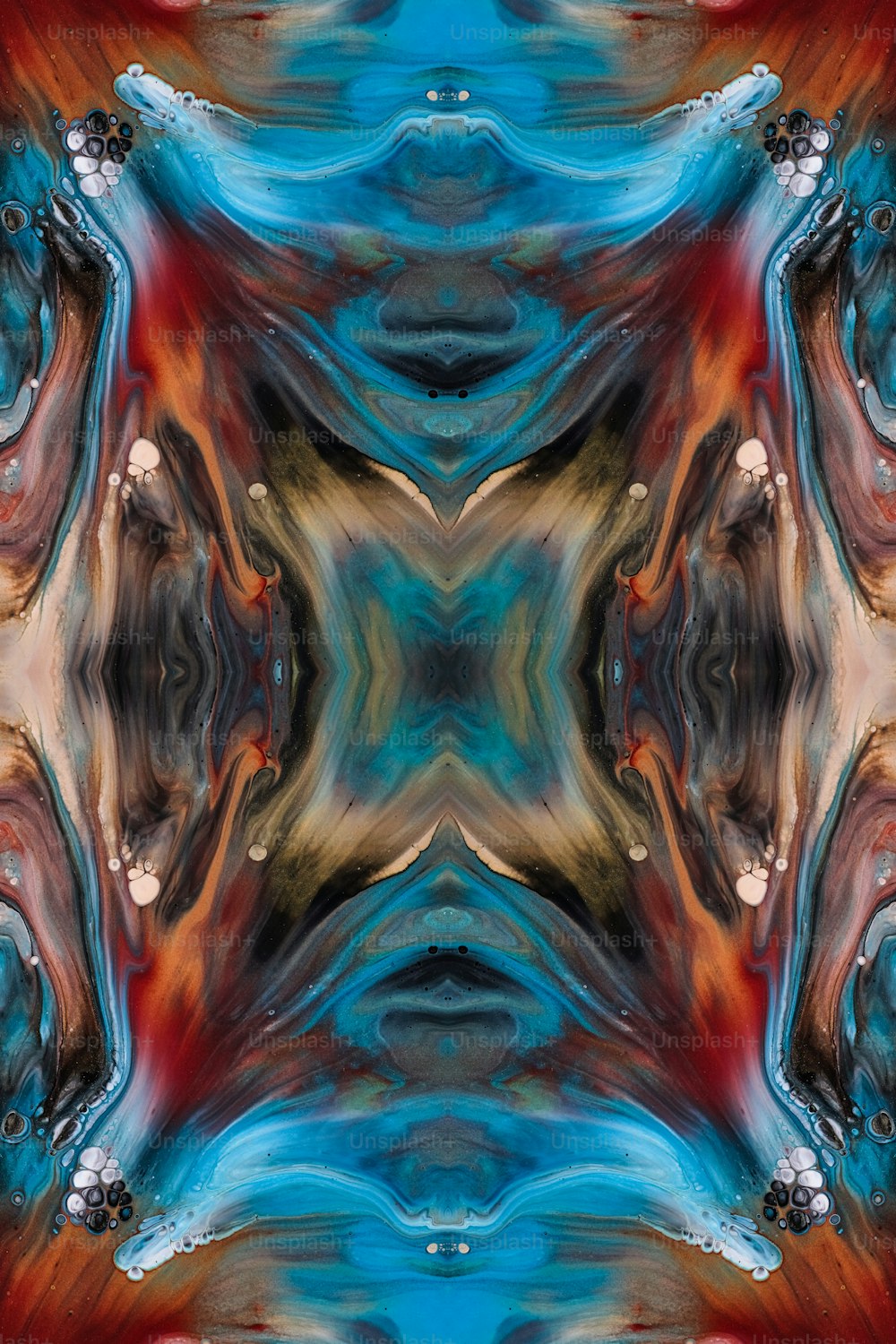 an abstract image of a red, blue, and orange design