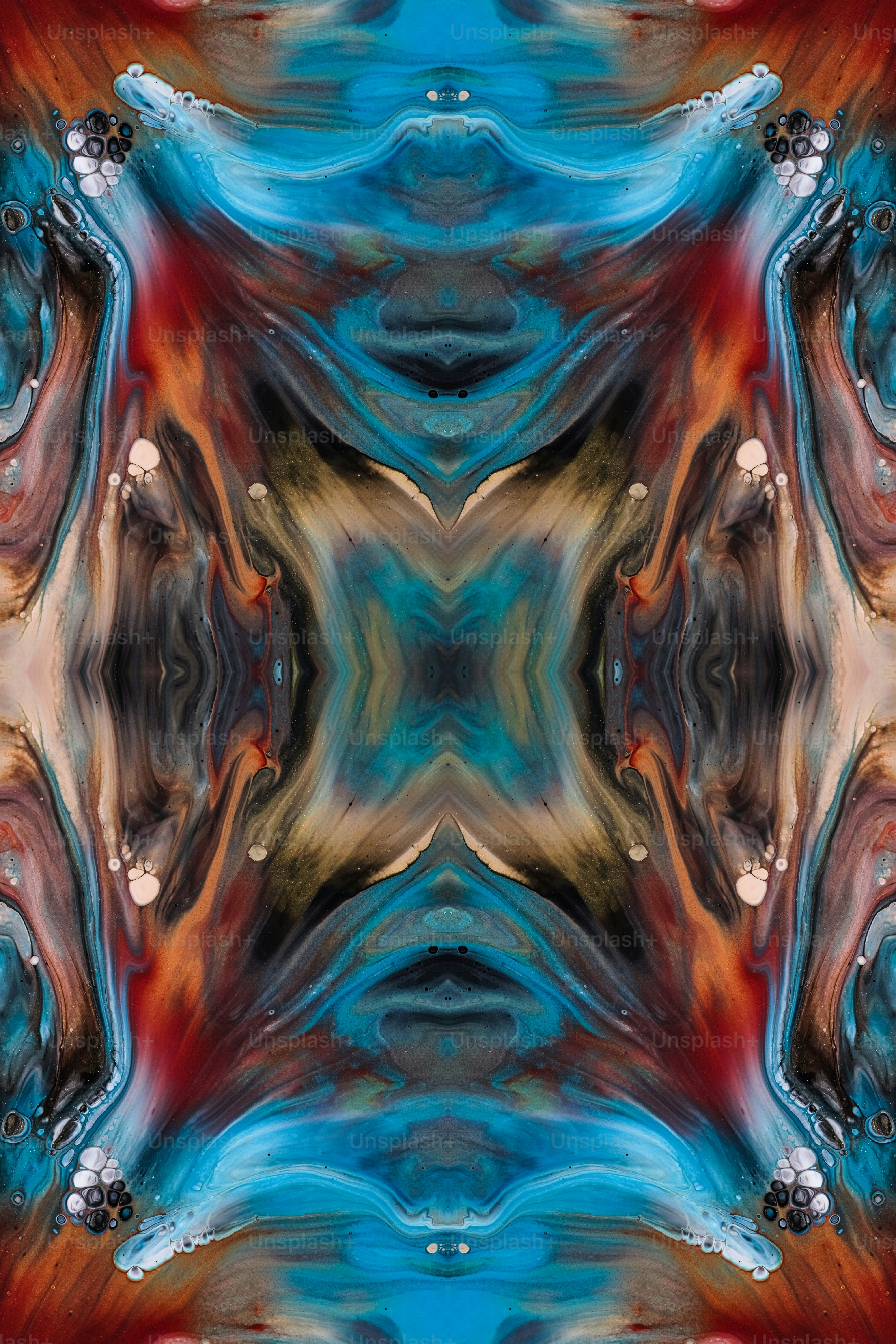 an abstract image of a red, blue, and orange design