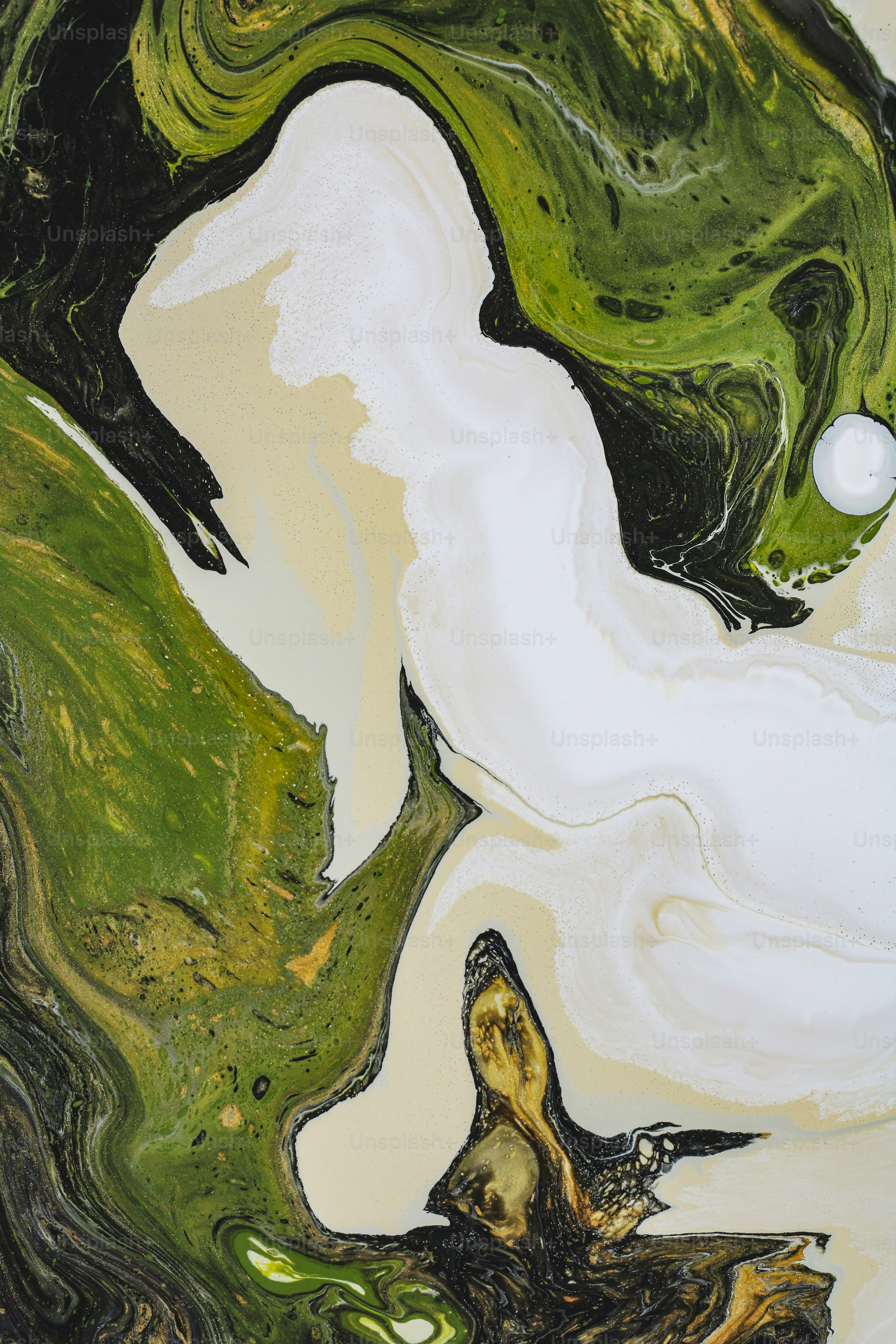 a painting of a green and white swirl