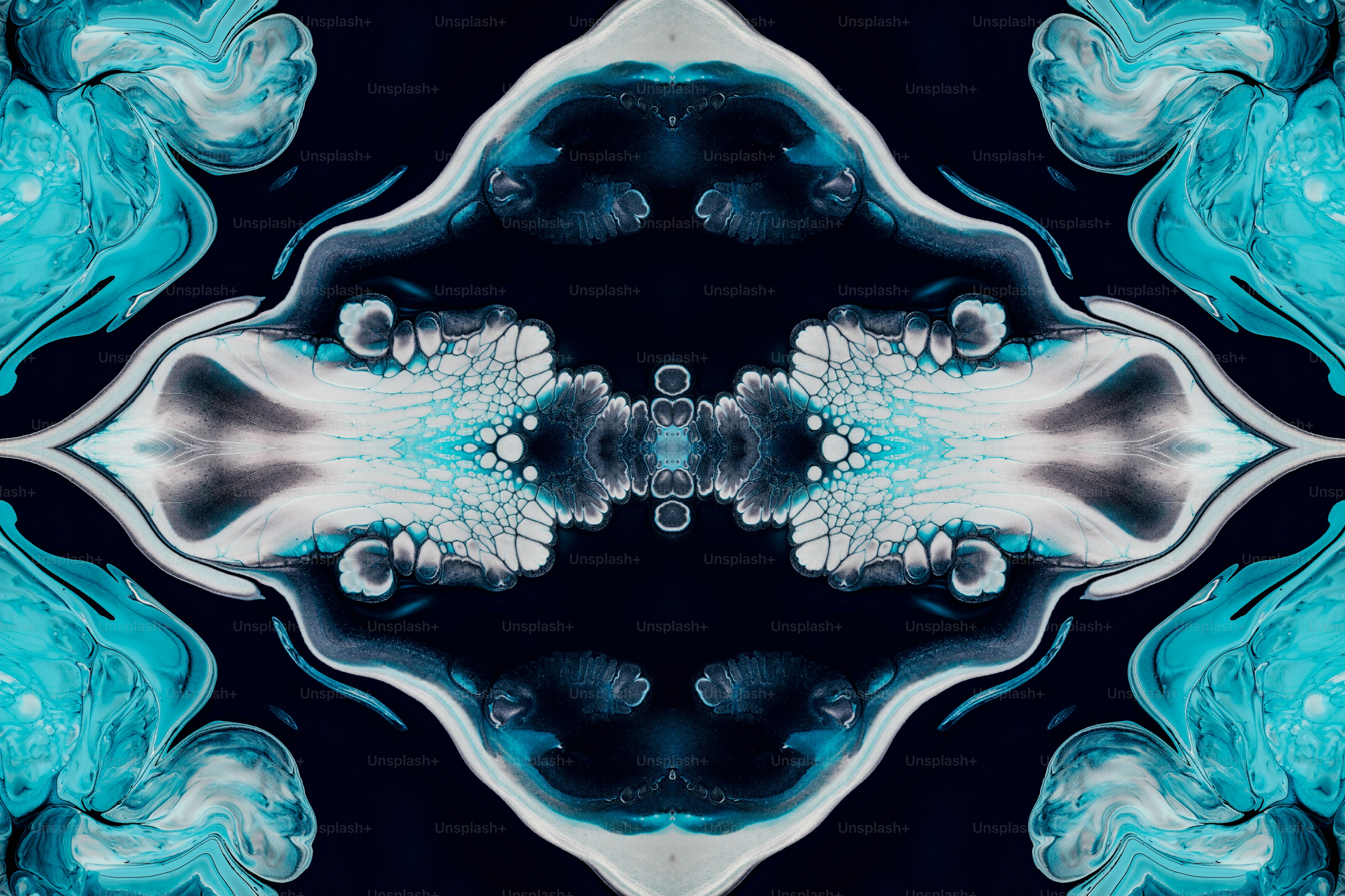 an abstract image of a blue and white flower