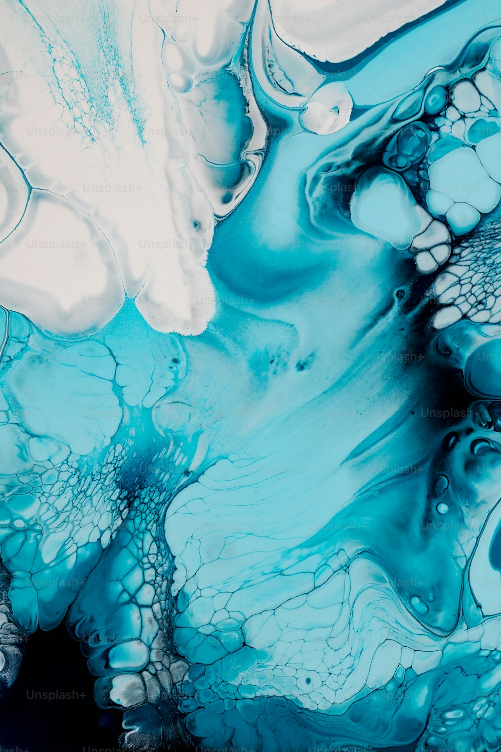 a close up of a blue and white substance
