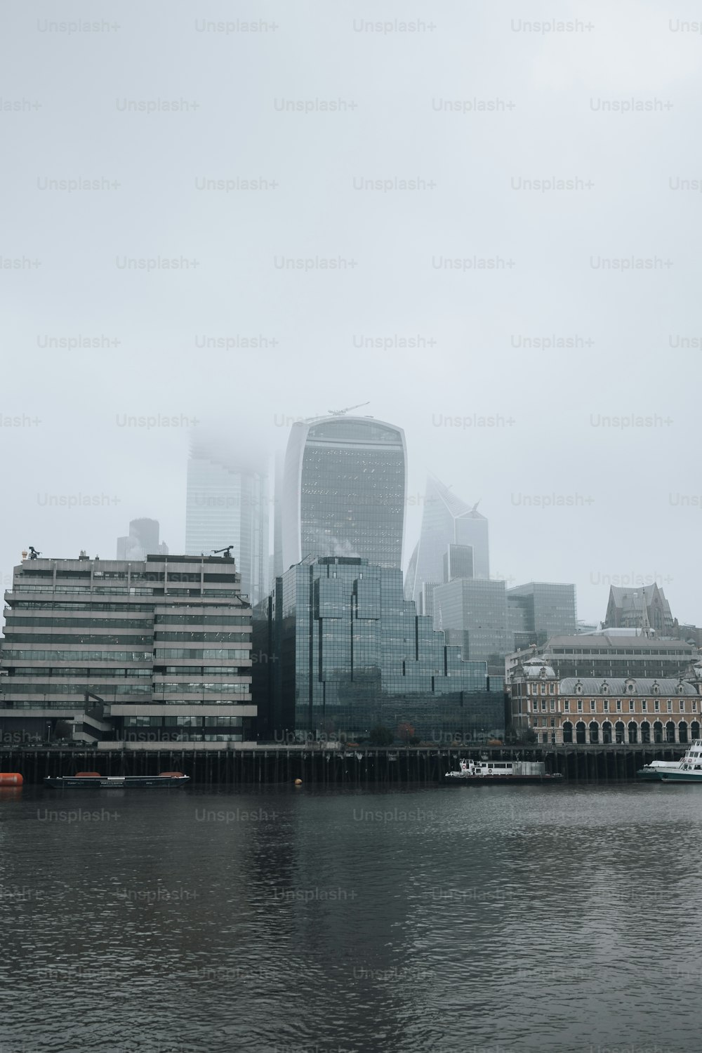 a large body of water with a city in the background