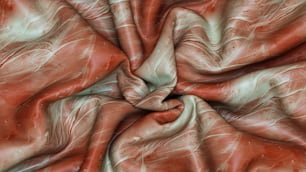 a close up of a red and white fabric