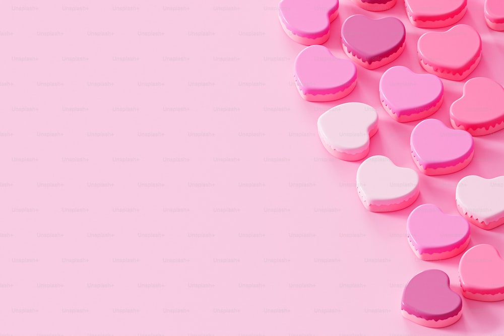 a group of pink and white hearts on a pink background