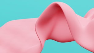 a close up of a pink object on a blue background