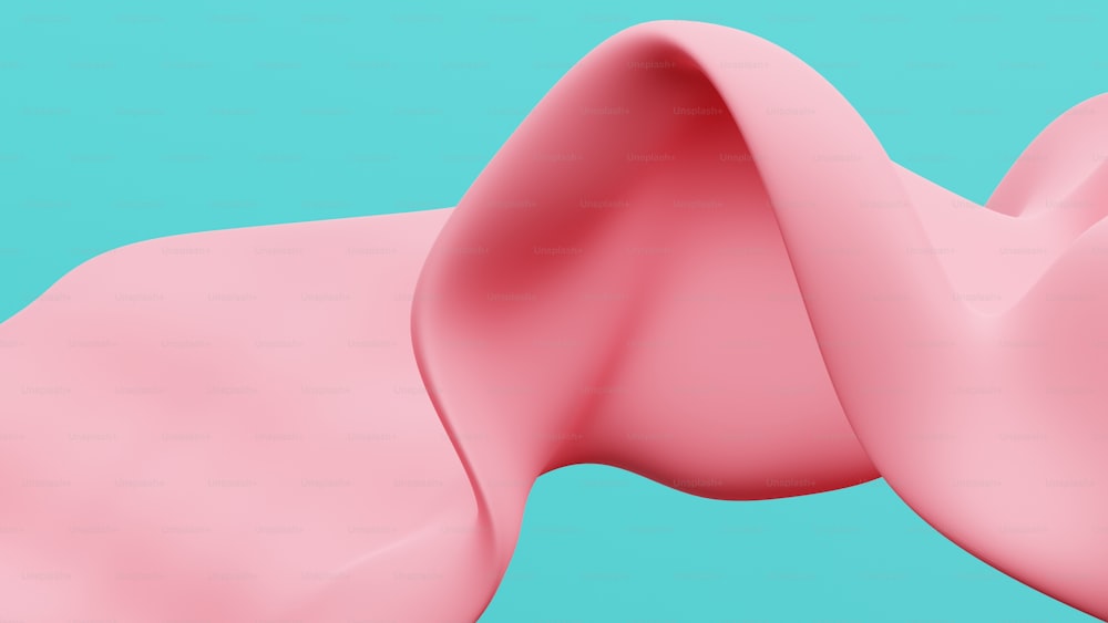 a close up of a pink object on a blue background