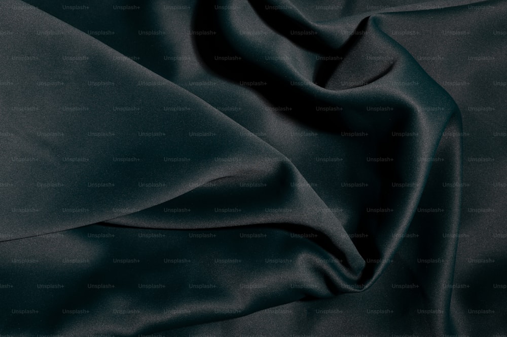 a close up view of a dark blue fabric